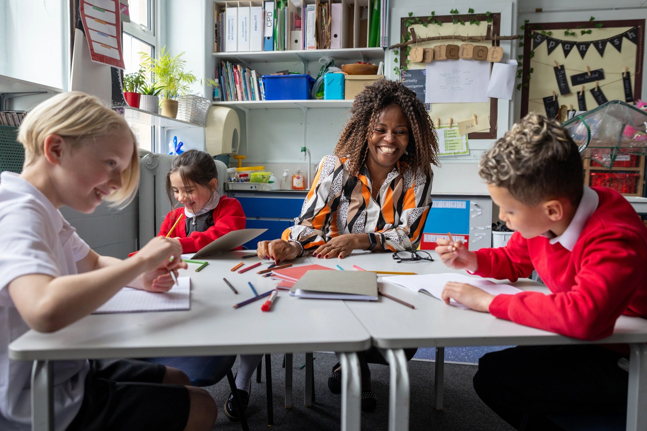 Teacher with students in classroom