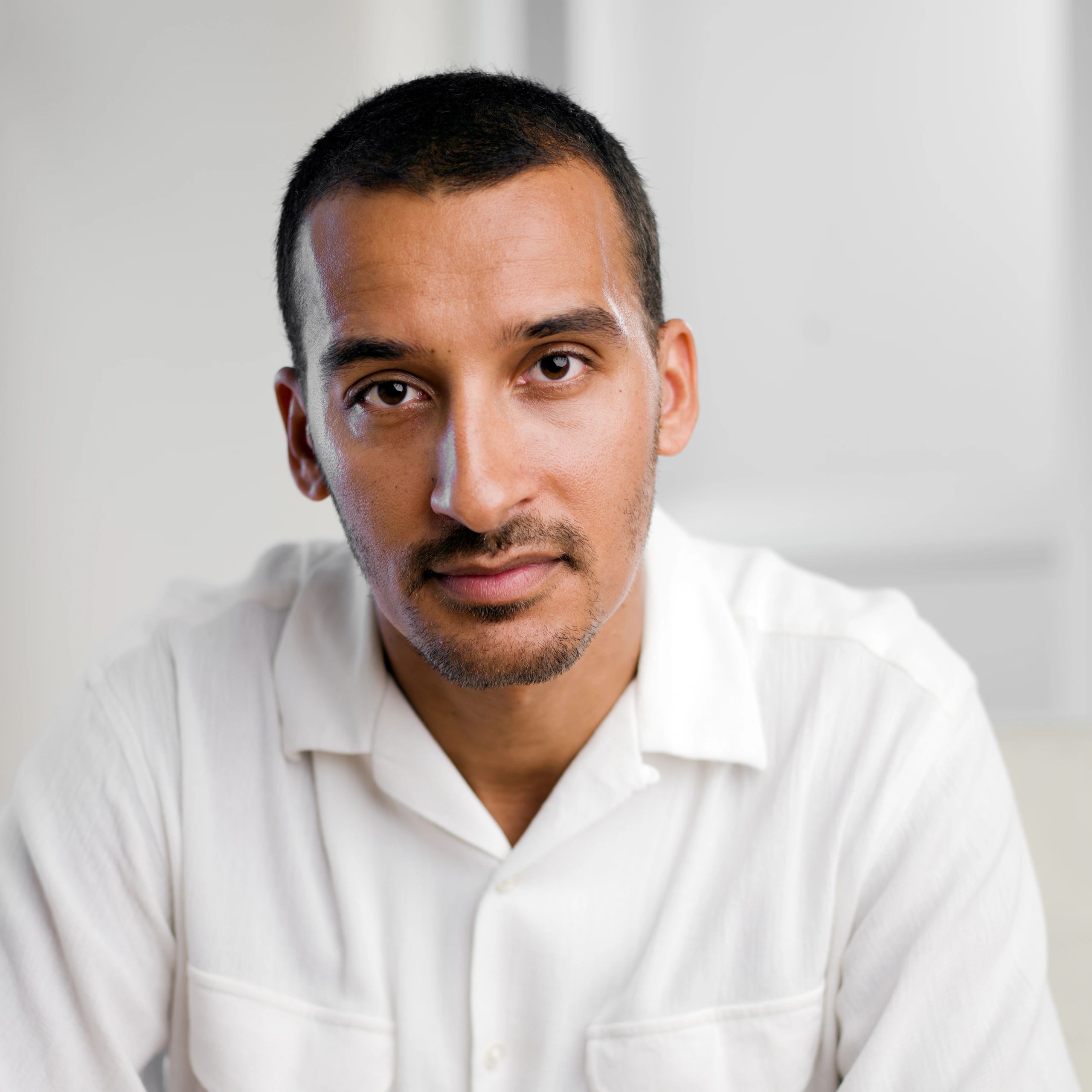 Egyptian male teacher testimonial portrait