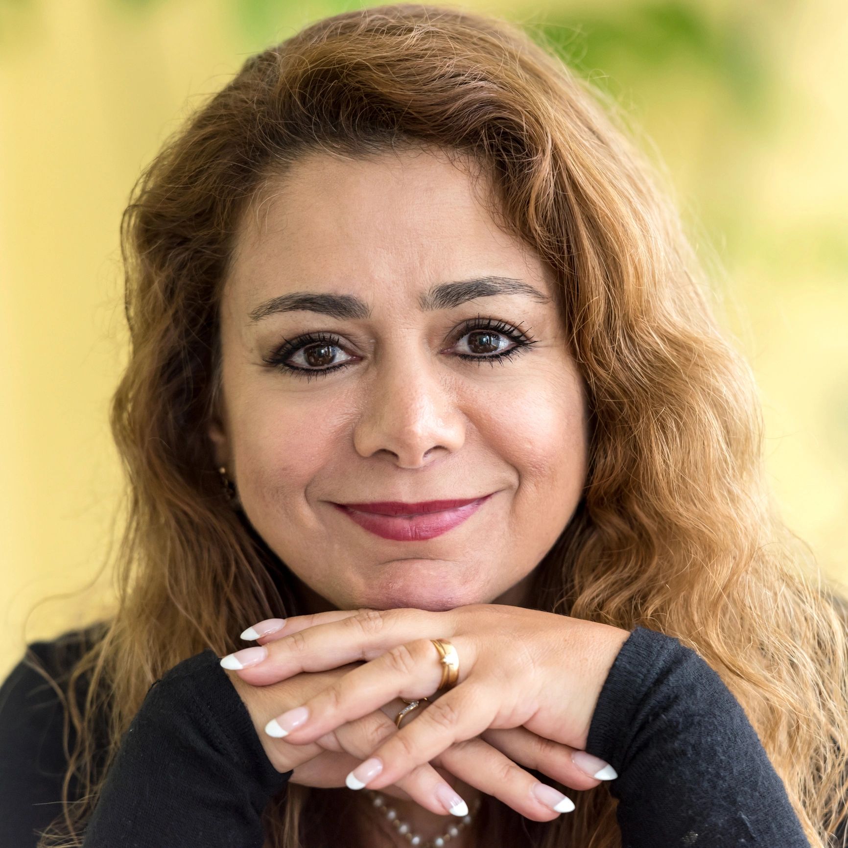 Egyptian teacher testimonial portrait